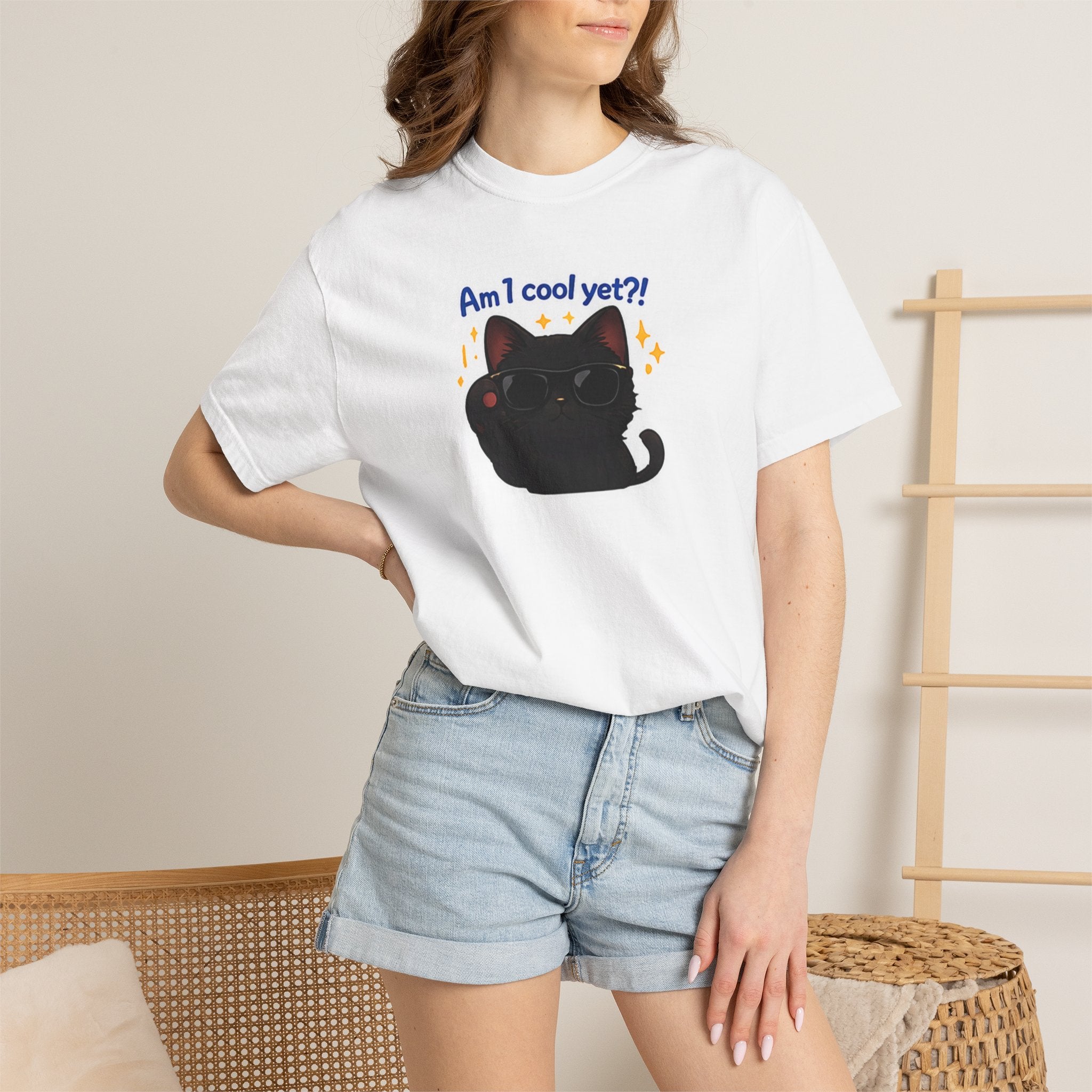 Black cat graphic T-shirt from Printify featuring the phrase "Am I Cool Yet?" on a casual black cotton tee.