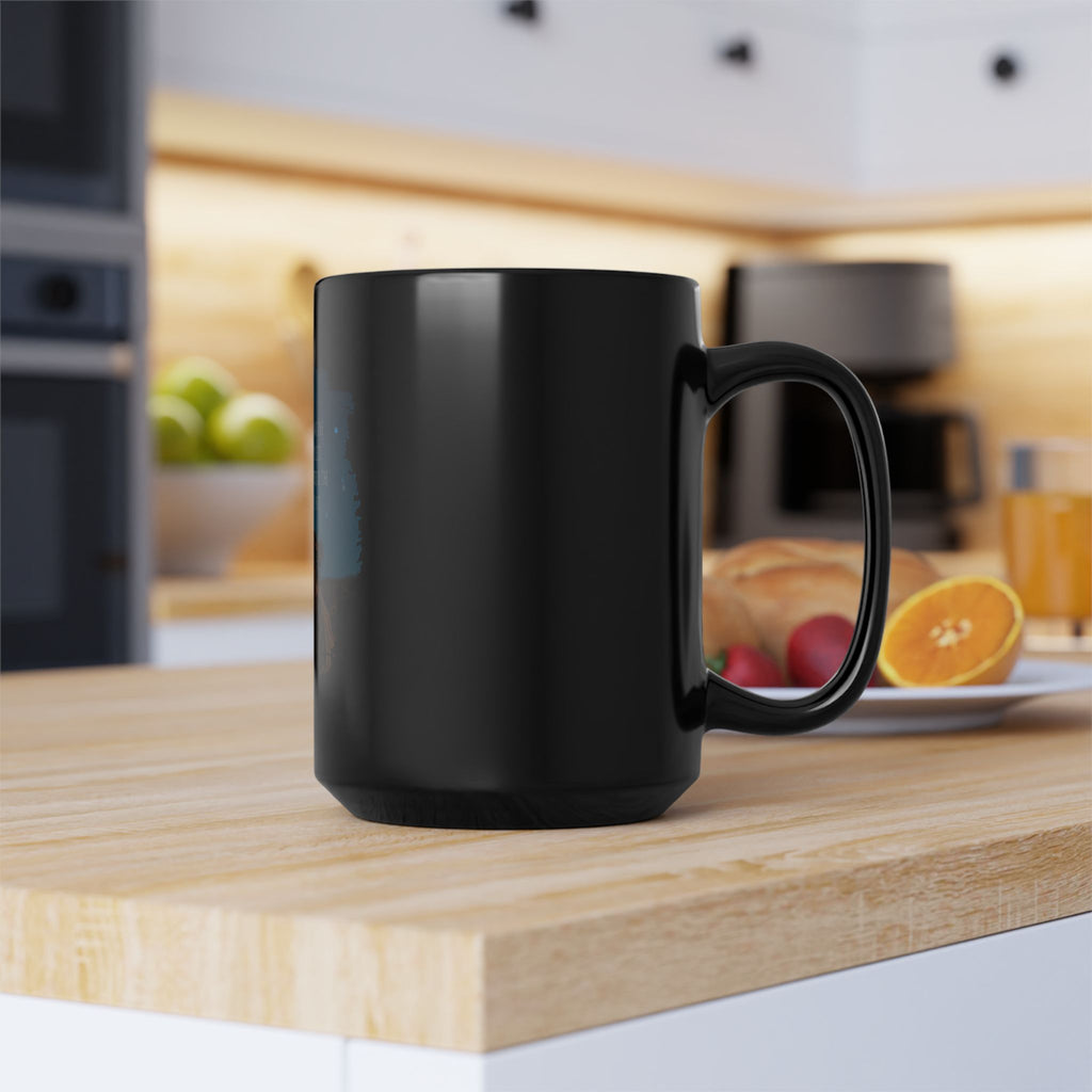 Black ceramic mug with inspirational quote about love, featuring white text and a simple, modern design.