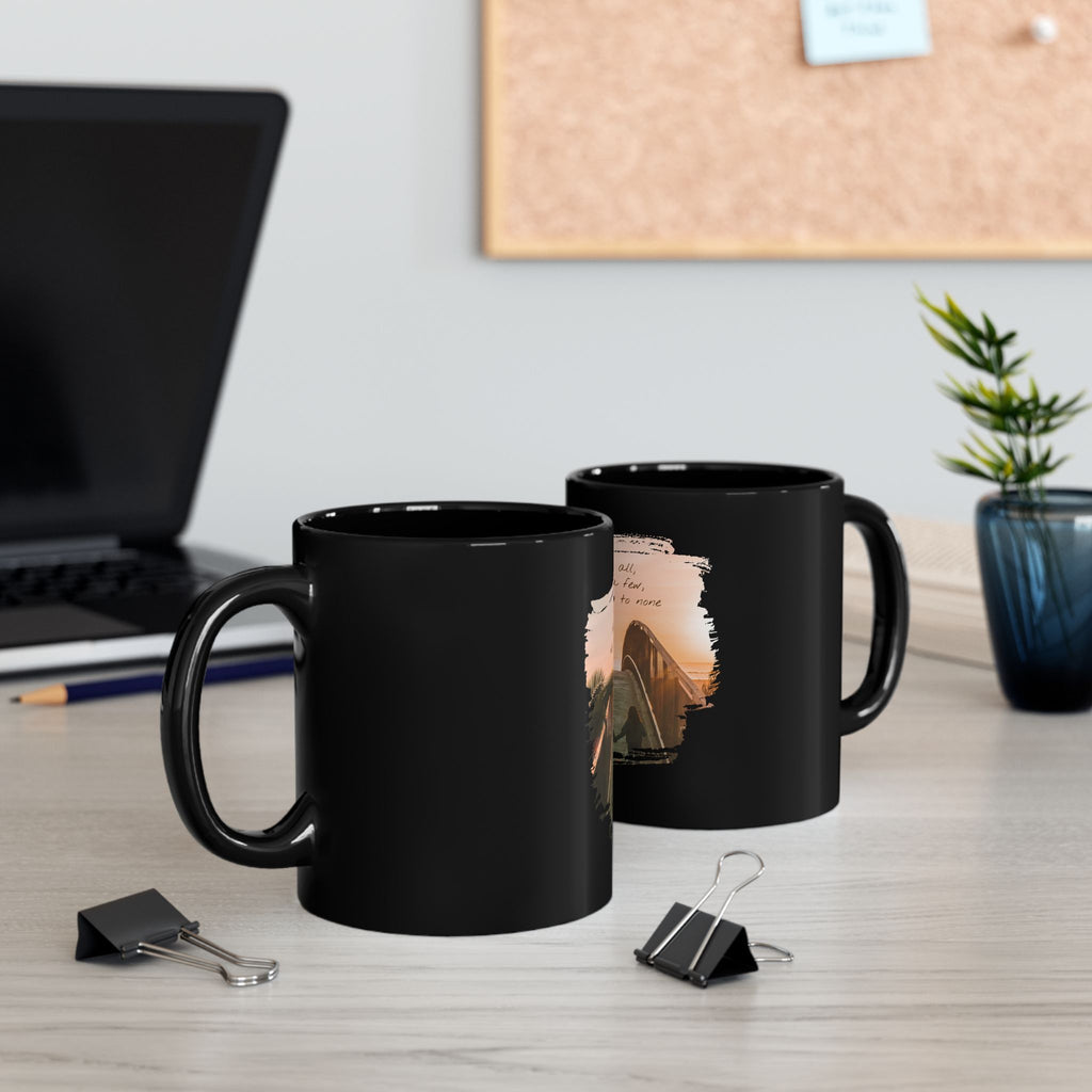 Black ceramic mug with the quote "Love all, trust a few, do wrong to none" in white text, ideal for coffee or tea.