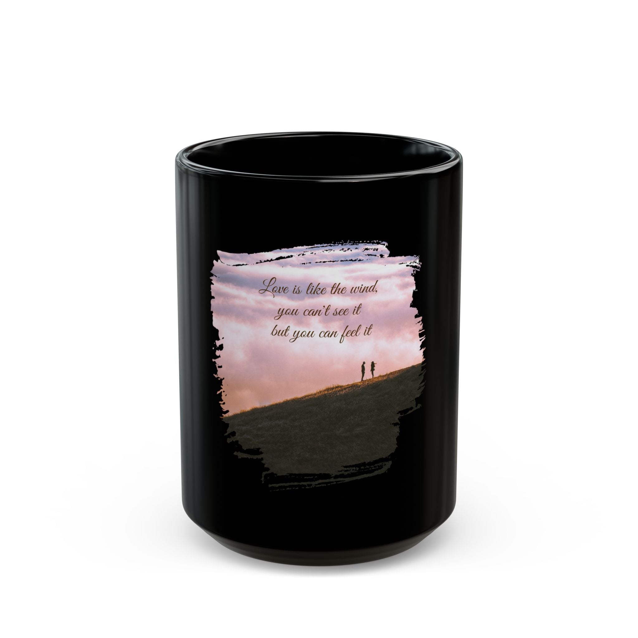 Black ceramic mug with the quote "Love is like the wind, you can't see it but you can feel it" printed on it, ideal for everyday use.