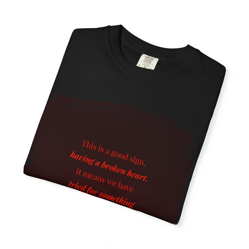 Printify T-Shirt featuring a broken heart design with the phrase "Having a broken heart" printed on the front.