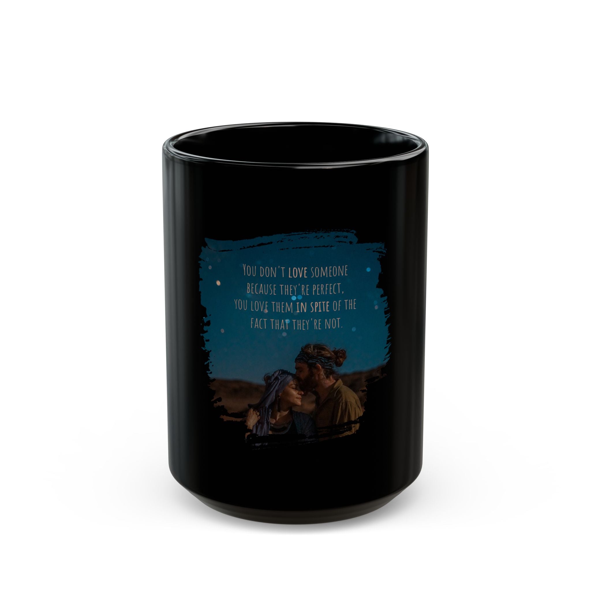 Black ceramic mug featuring the quote "You don’t love someone because they’re perfect, you love them in spite of that" by Printify.