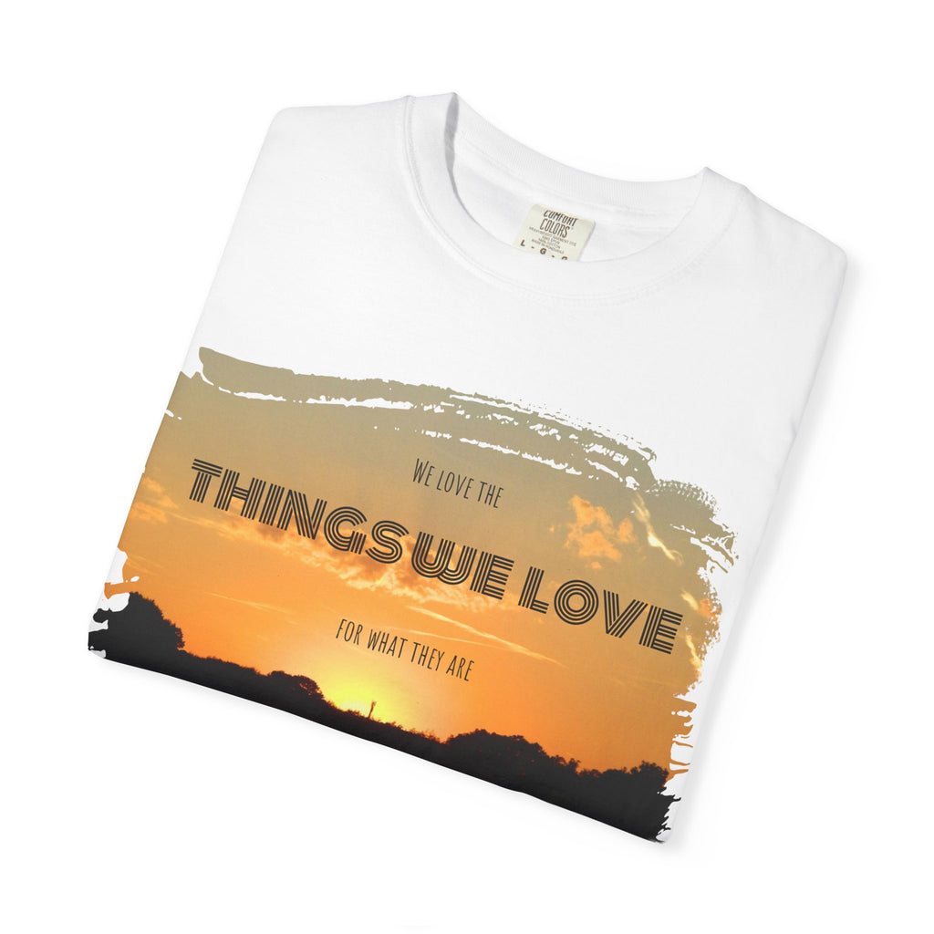 Black Printify T-shirt with the phrase "We love the things we love for what they are" printed in white text.