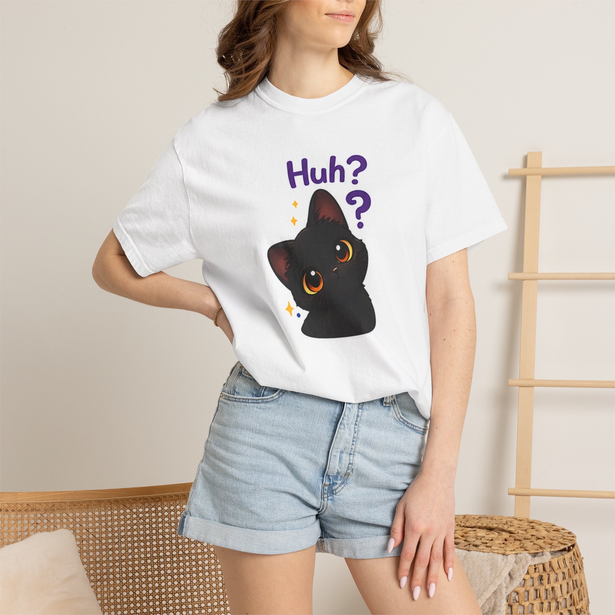 Black cat T-shirt by Printify featuring a cute cat graphic on a comfortable black fabric.